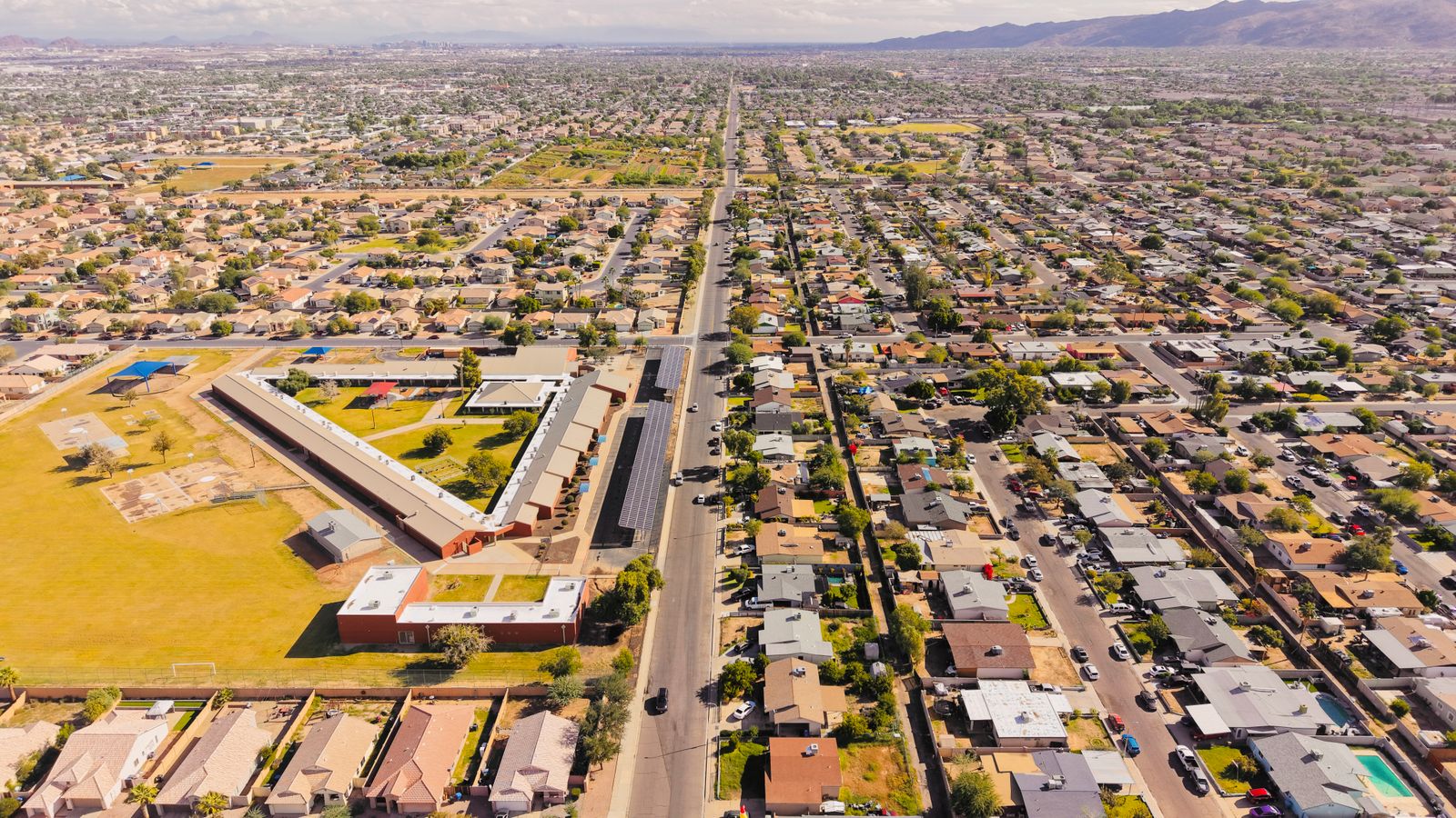 Wide view over Southern Arizona neighbourhoods on a bright day