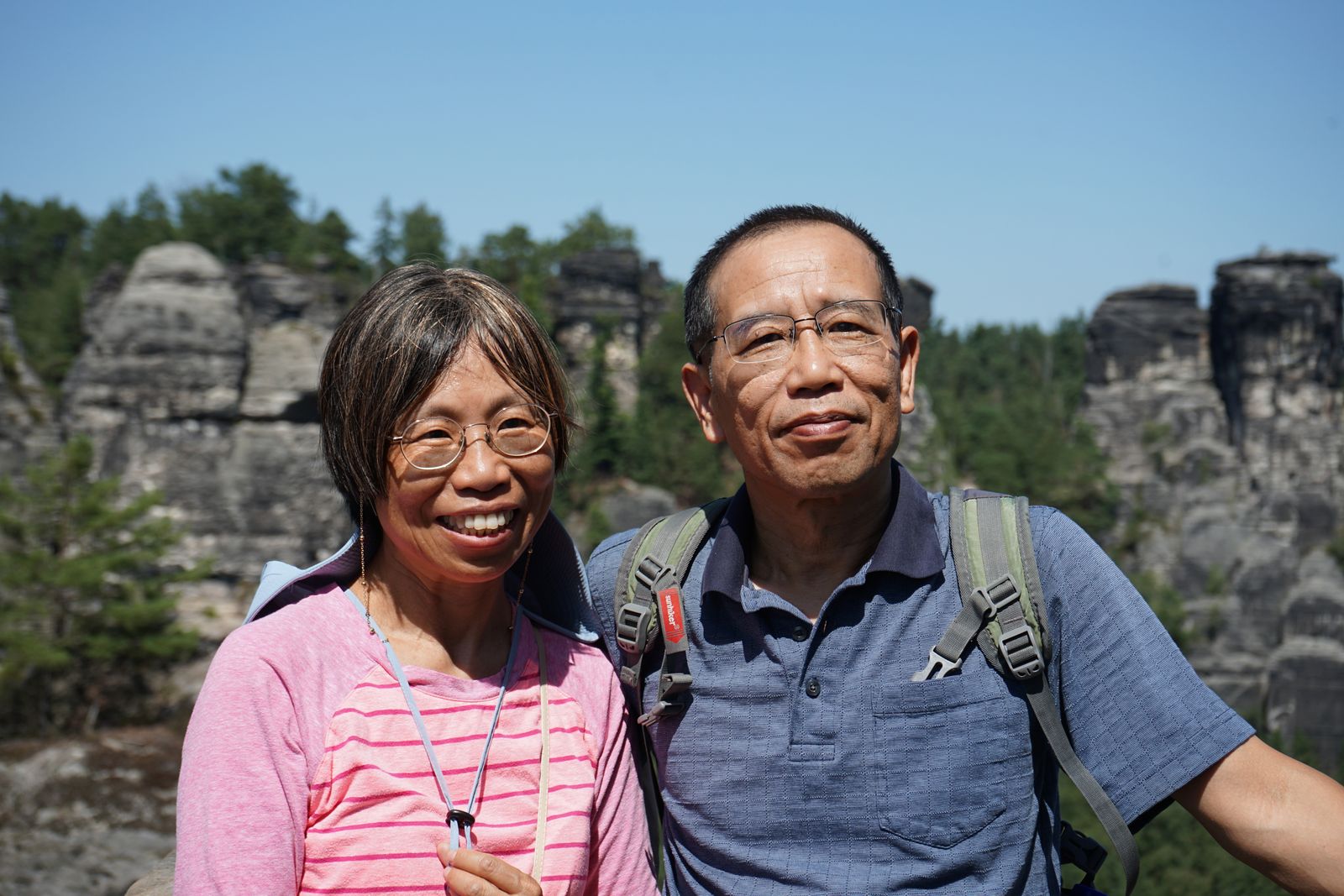 Retired couple exploring a rocky desert landscape together